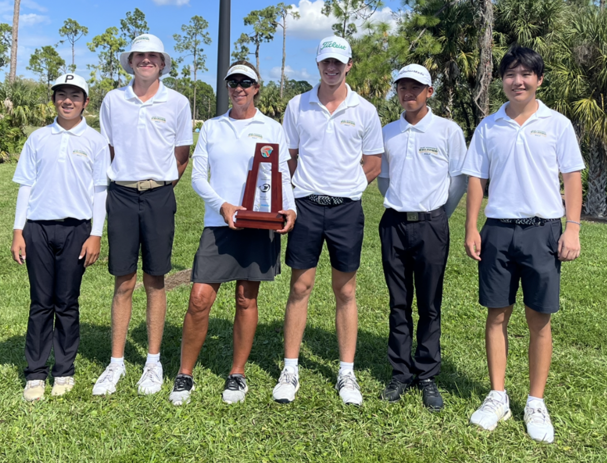 The boys golf team won the Region 3 championship on Tuesday at the Valencia Golf and Country Club in Naples.  Coach Judy Carlson proudly holds the trophy. 